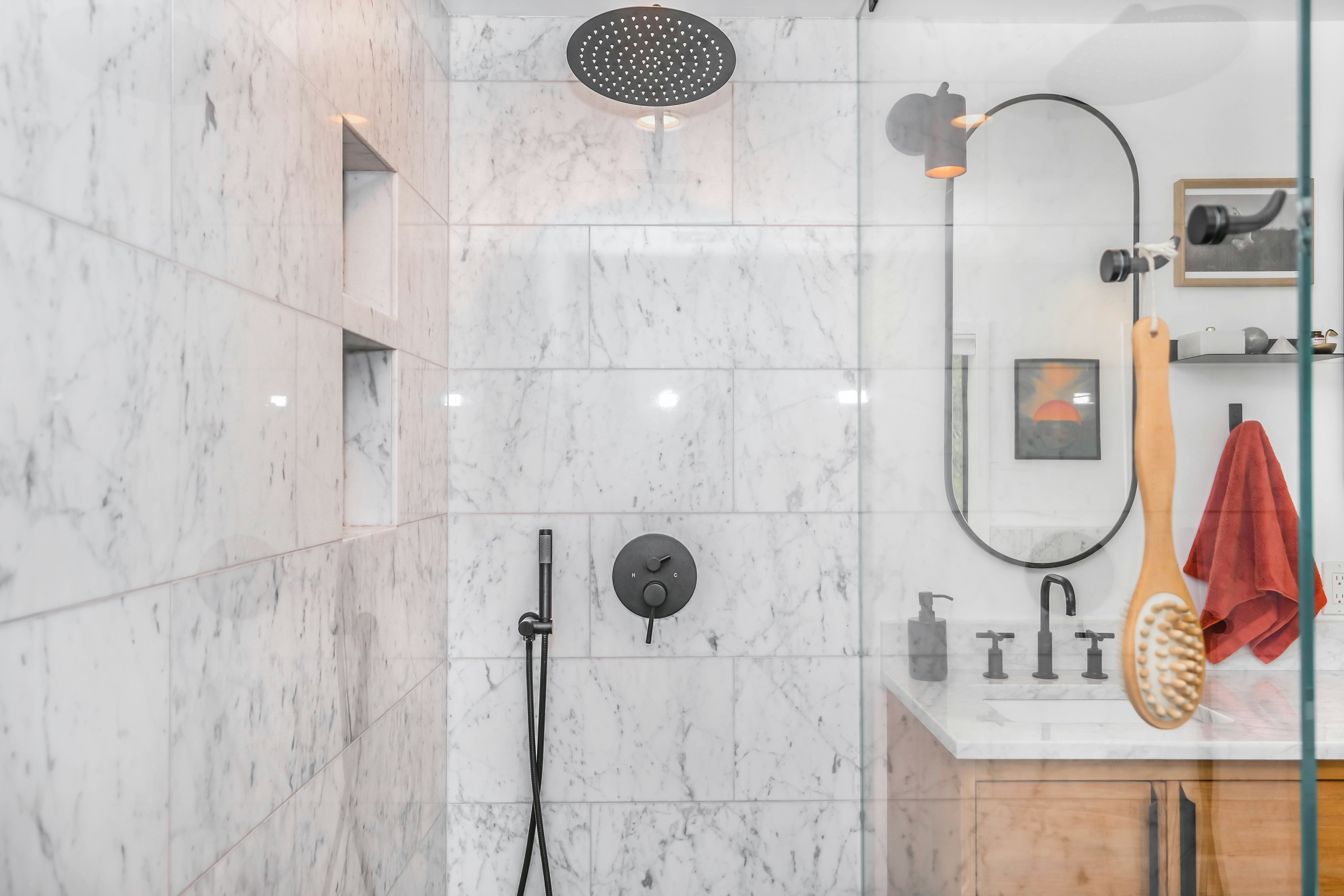 Black Showerhead on a White Tile Wall